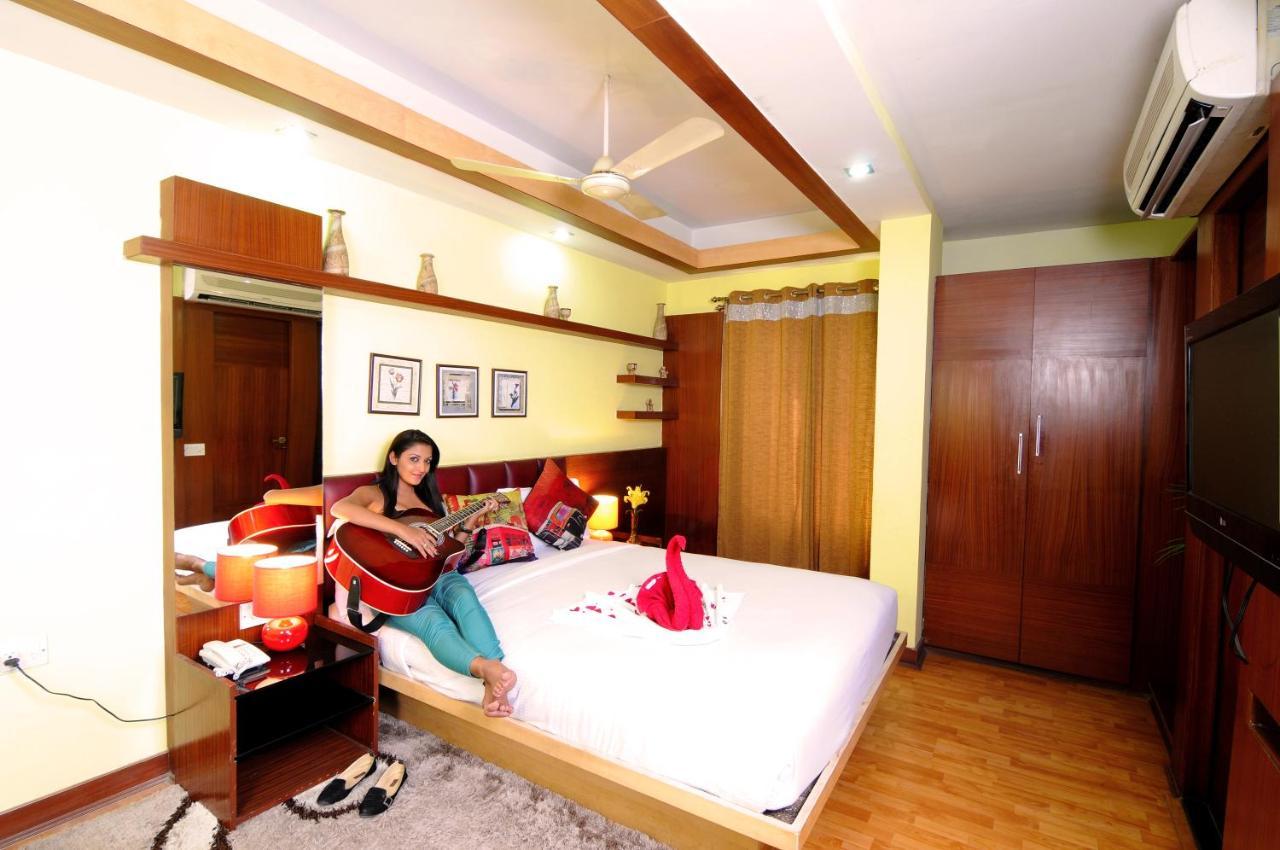 Capital O 3246 The Bouvice Hotel Bangalore Exterior foto