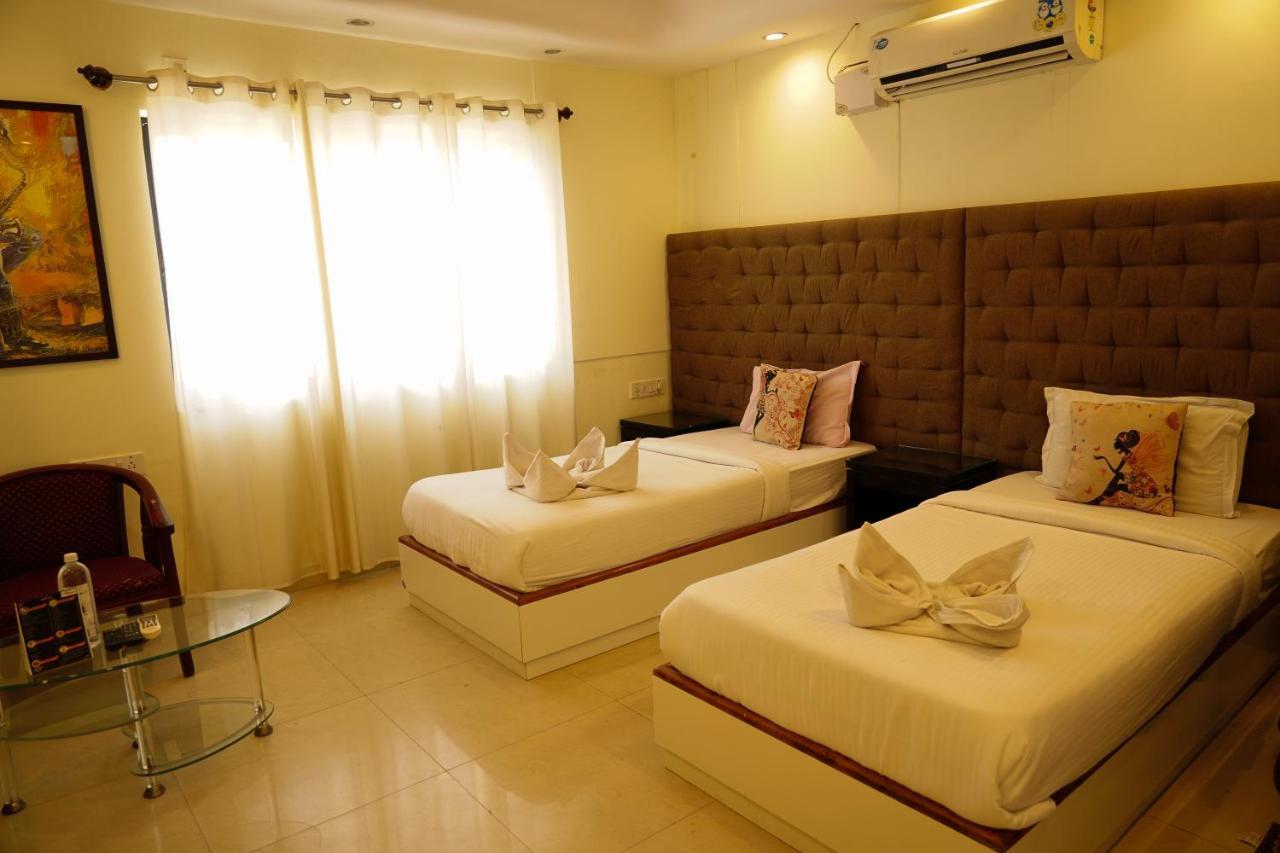 Capital O 3246 The Bouvice Hotel Bangalore Exterior foto