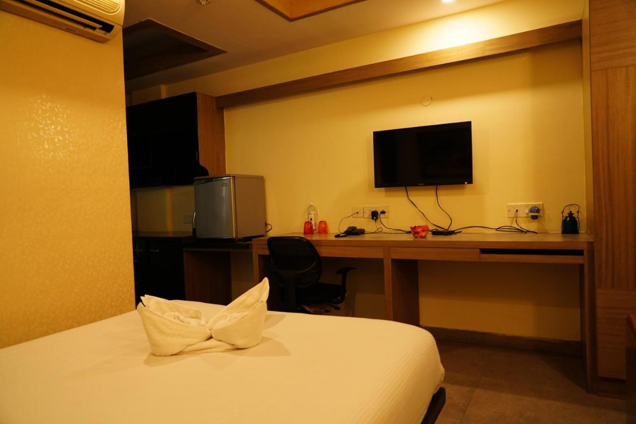 Capital O 3246 The Bouvice Hotel Bangalore Exterior foto